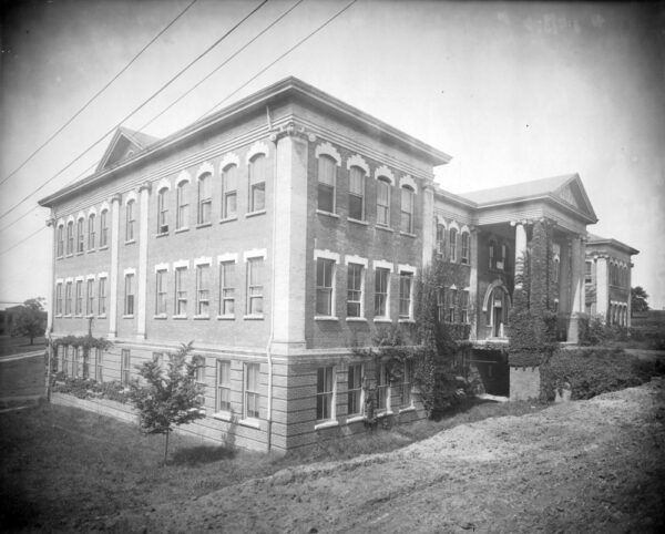 Black and white photo of exterior of Winston Hall. Circa 1910.