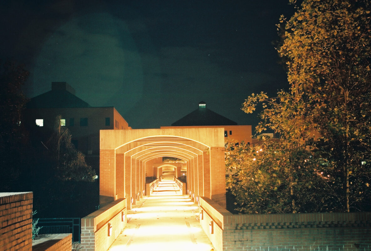 Nighttime view of brick pathway on NC State's Centennial Campus.