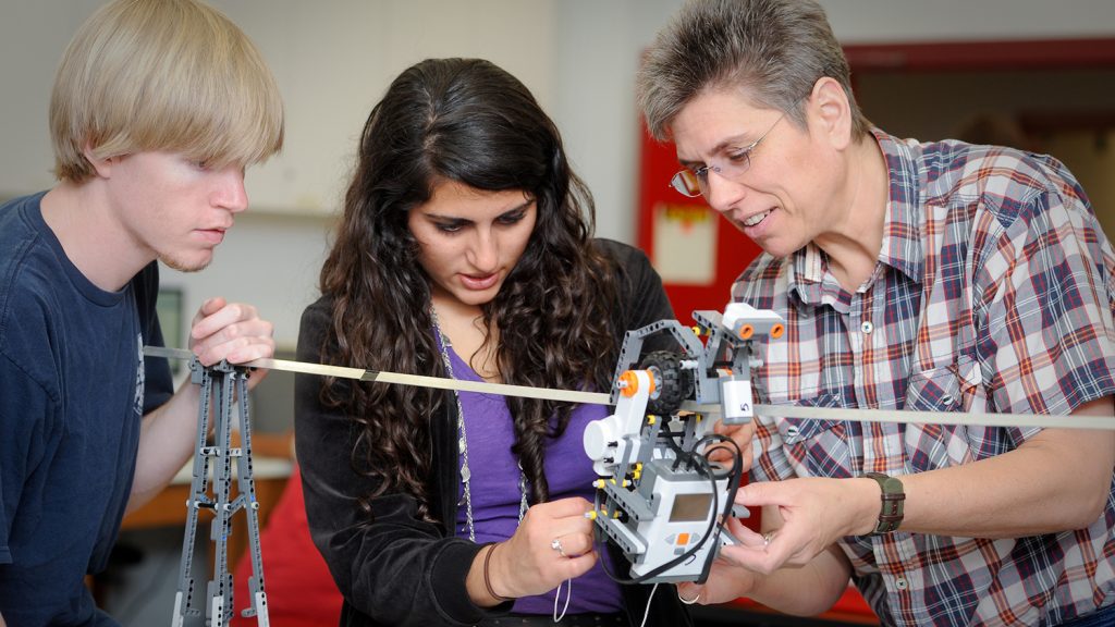 Dr. Terri Varnado works with College of Education students in one of her robotics classes. NCSU/Photo by Becky Kirkland."