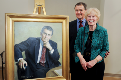 Dr. Nino Masnari was joined by his wife, Judy, at the portrait unveiling on March 18. 