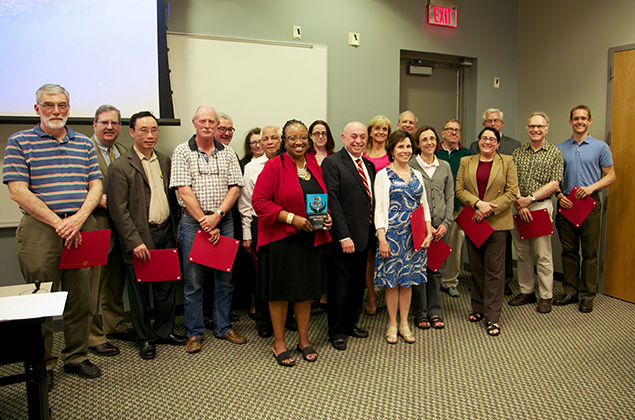 College of Engineering faculty members receive the inaugural Faculty-2-Faculty Mentor Recognition during the College's spring faculty meeting.