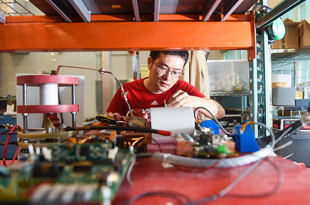 Researcher working in lab.