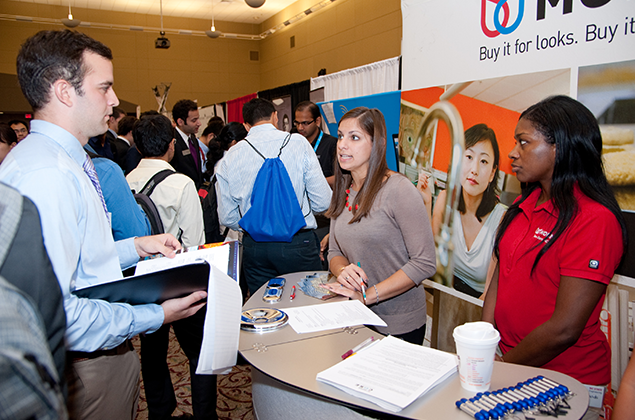 Career Fair participants interact with recruiters.