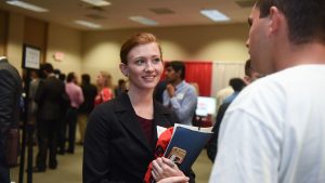 Student talks to potential employer at Fall 2016 Engineering Career Fair.