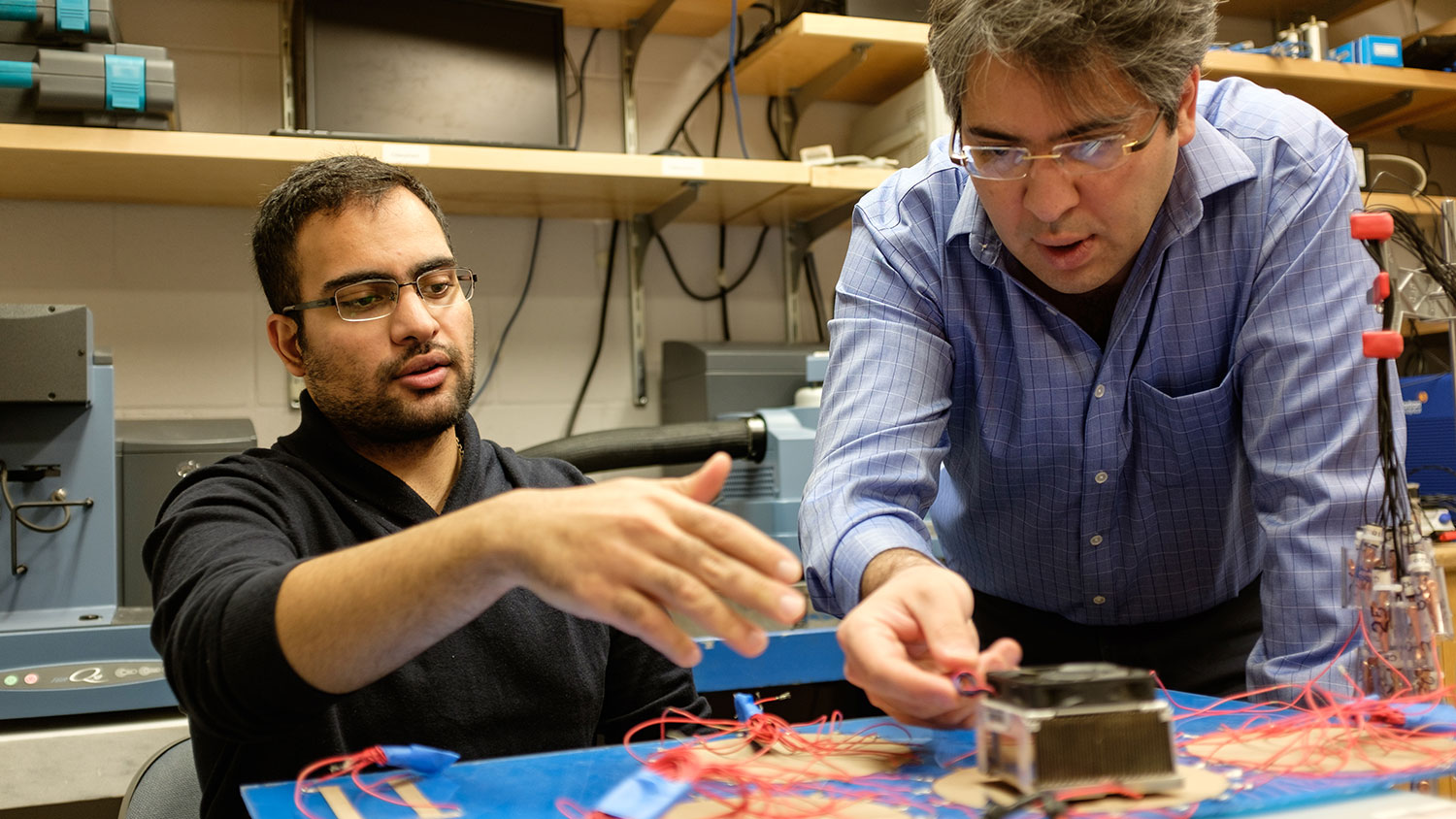 Mohammad Pour-Ghaz with Reza Rathetnia in lab