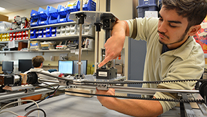 Arthur Candido works in the lab.