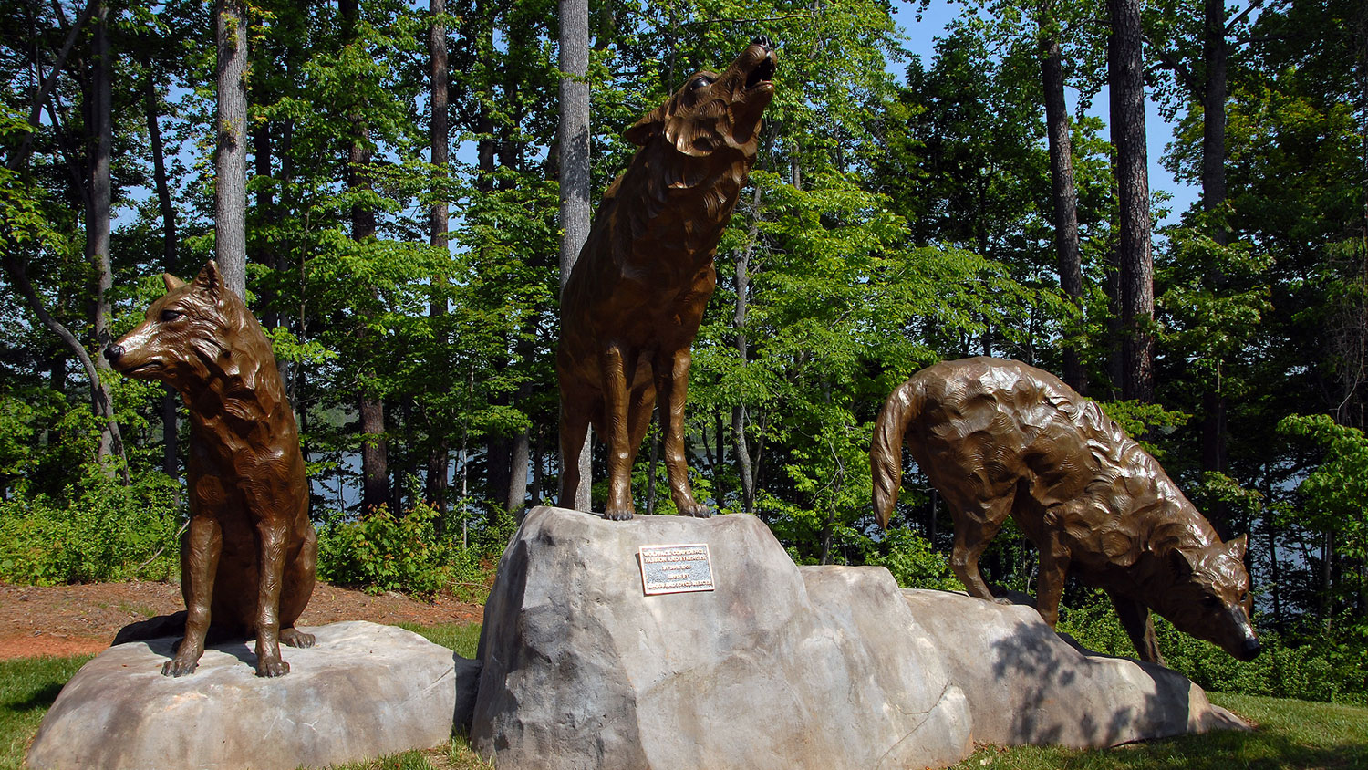 Statues of three wolves