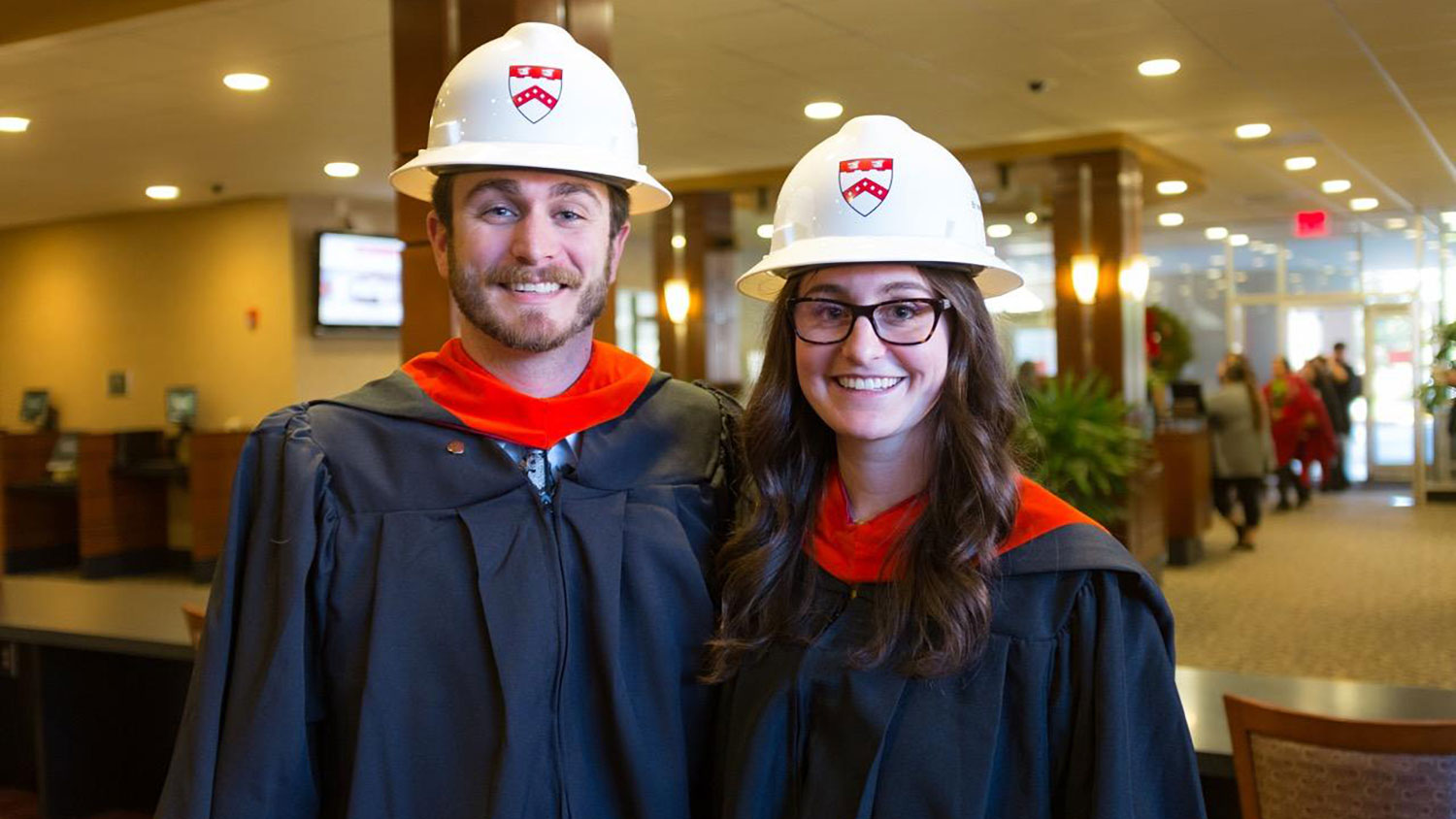 As co-workers, Jonathan Holtvedt and Lauren McCauley partnered up to complete their master’s degrees online in just two years.