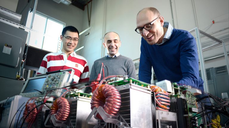 Electrical engineering researchers working in FREEDM lab