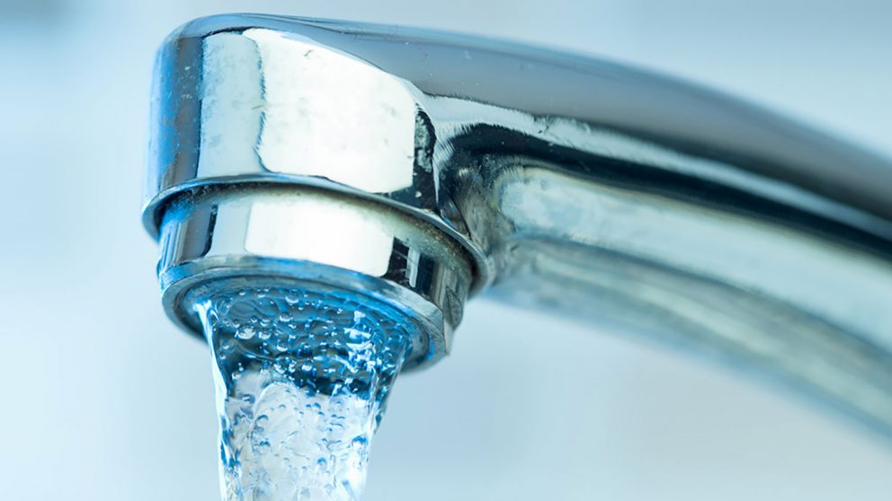water streaming from a faucet