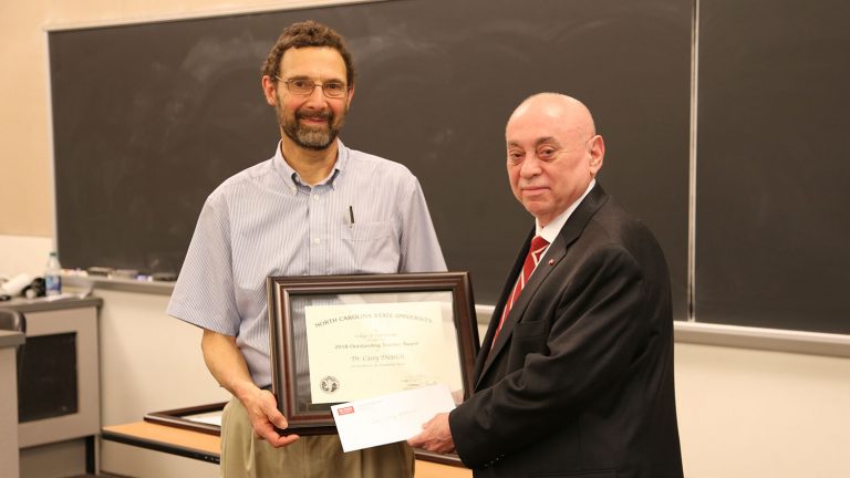 CCEE department head Dr. Morton Barlaz accepted the award on behalf of de los Reyes and Dietrich from Dean Louis Martin-Vega.