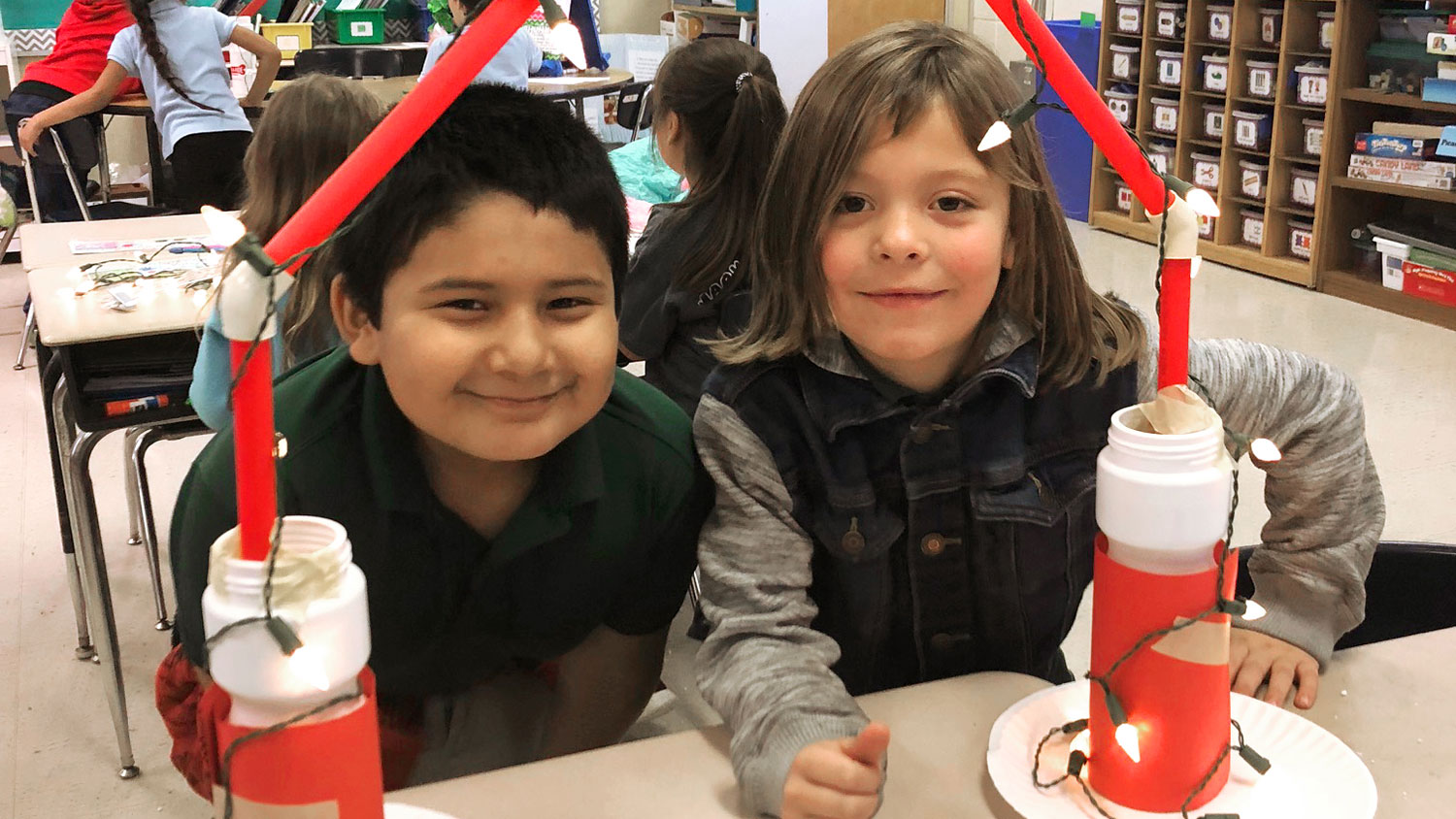 Two elementary school students working on a STEM project