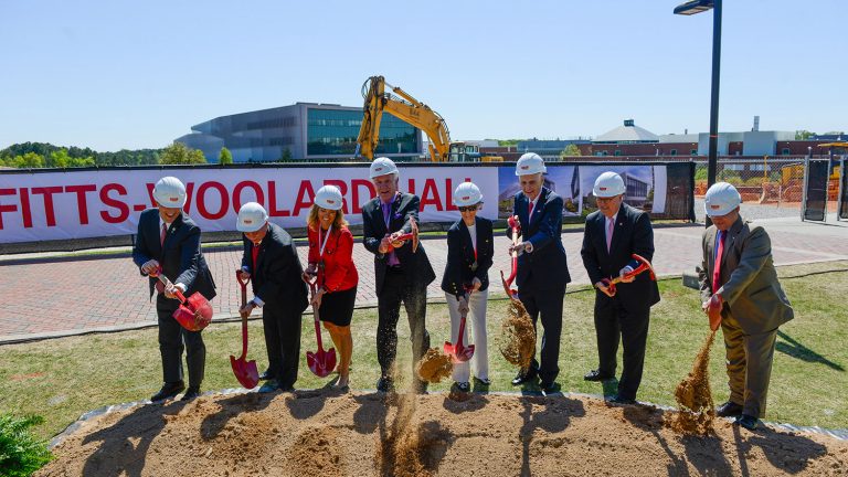 Dignitaries pose with shovels at the Fitts-Woolard Hall groundbreaking on April 20, 2018.