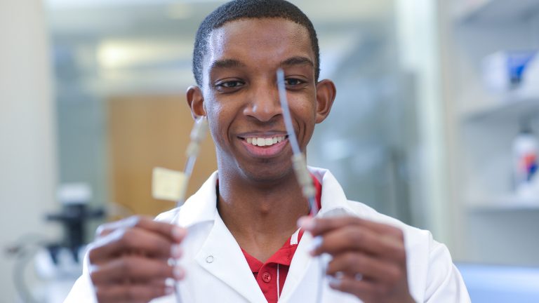 student researcher in lab