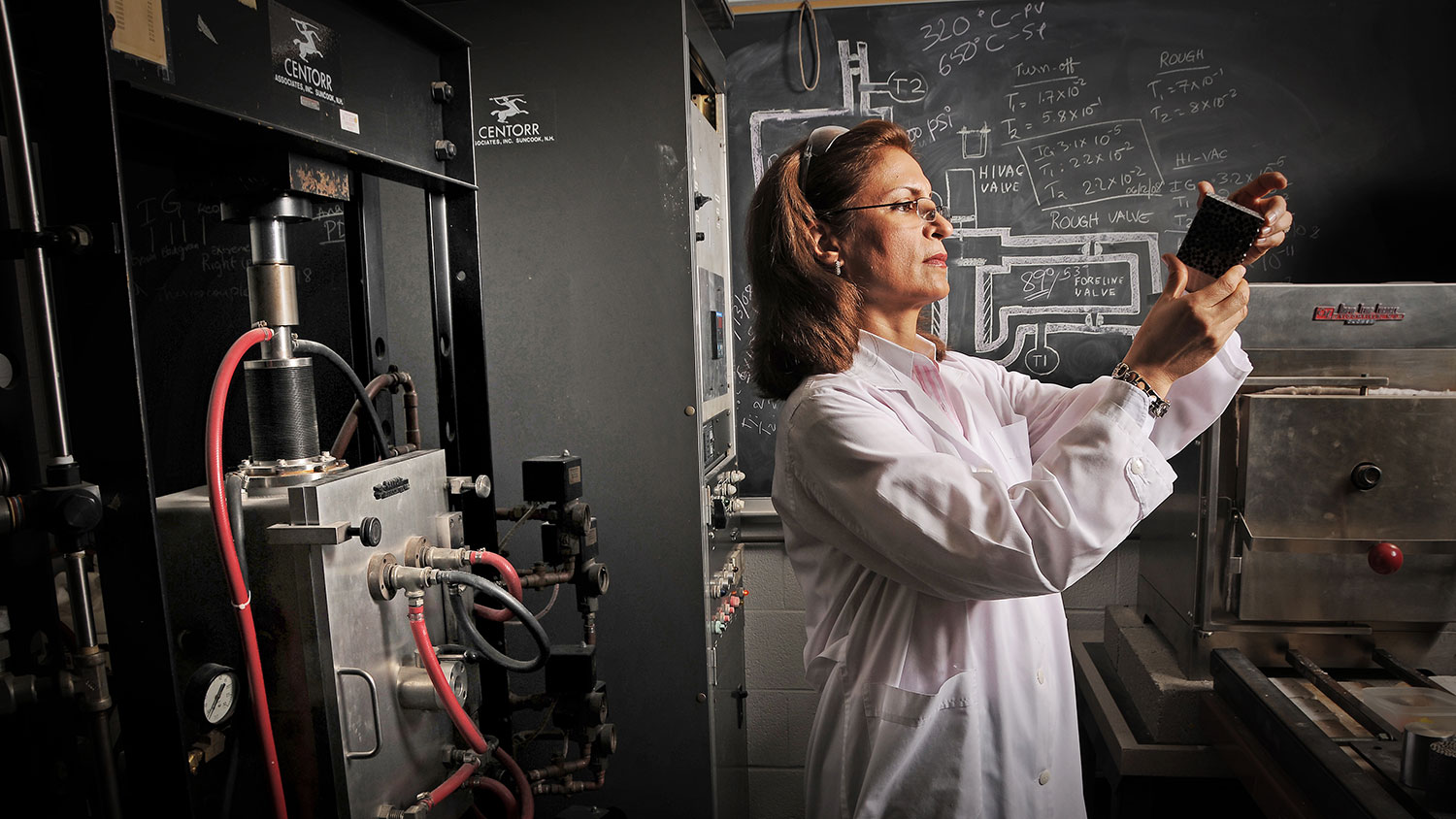 Dr. Afsaneh Rabiei examines composite metal foam in her lab.
