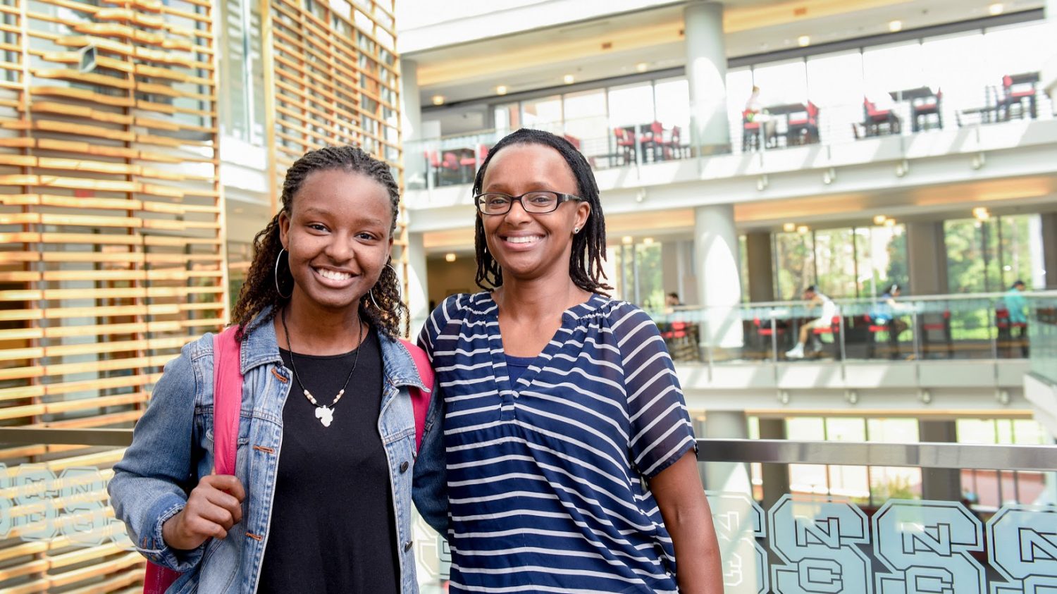 Sophomore Nyawira Nyota (left) and her mother, Professor Lynda Nyota, say the Employee Dependent's Tuition Scholarship has helped ease some of the financial burden of attending college.
