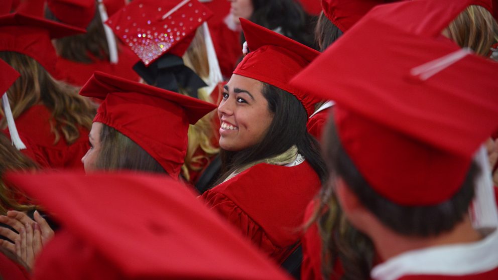 Happy students at commencement in PNC Arena.