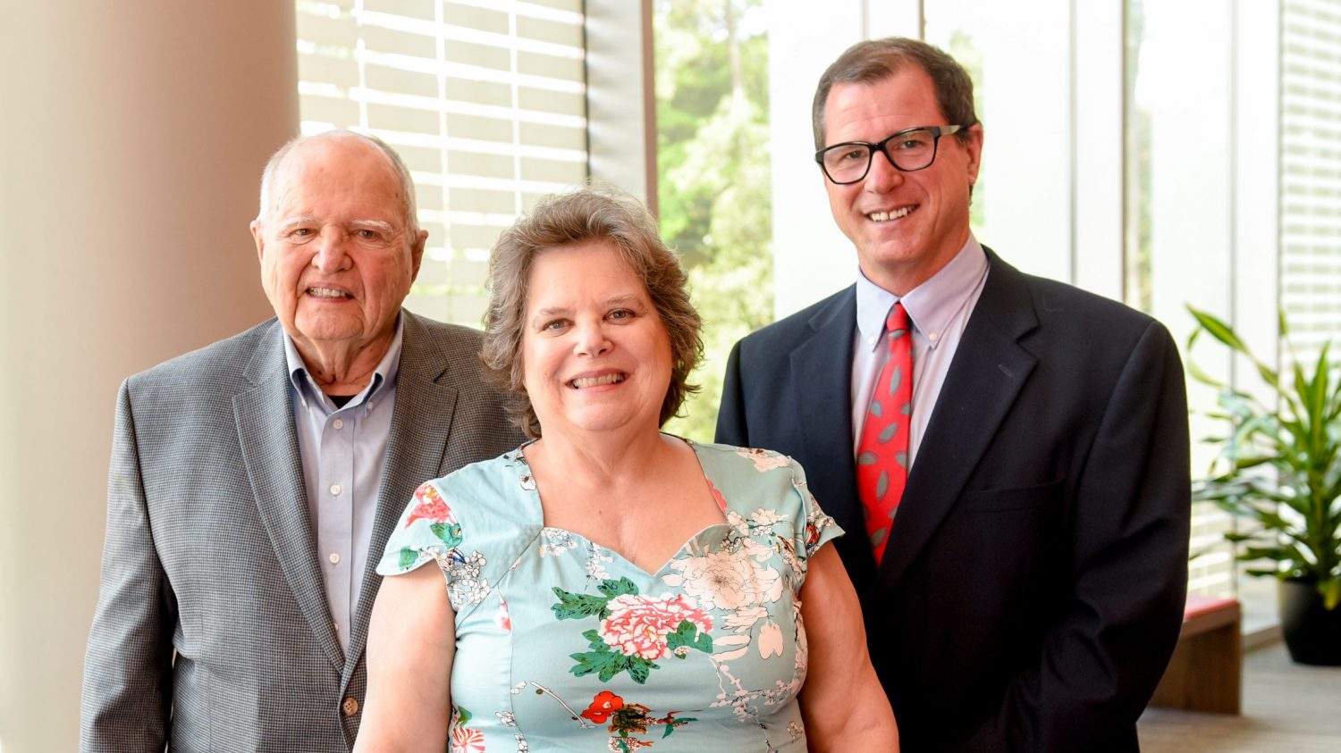 Jim Cauble with daughter Chris Roof and Lewis Cauble at the 2018 Pullen Society induction ceremony. Photo by Becky Kirkland.