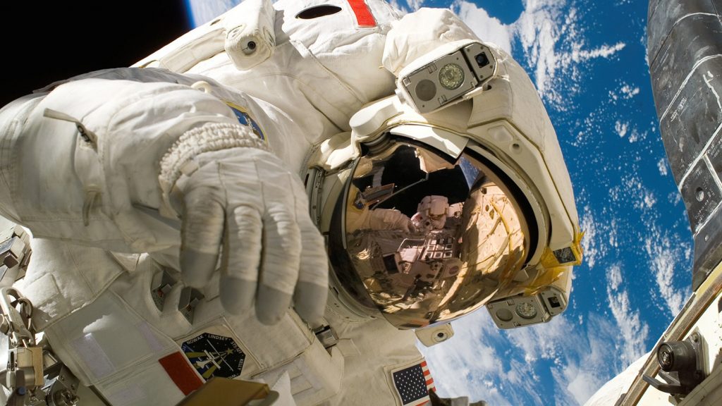 astronaut floating in space