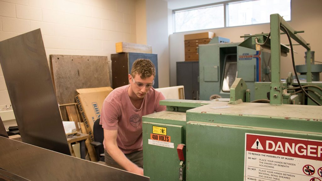 employee working in machine shop
