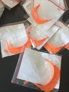3D-printed components for face shields from a network of volunteer printers have begun arriving at Engineering Building III on NC State's Centennial Campus.
