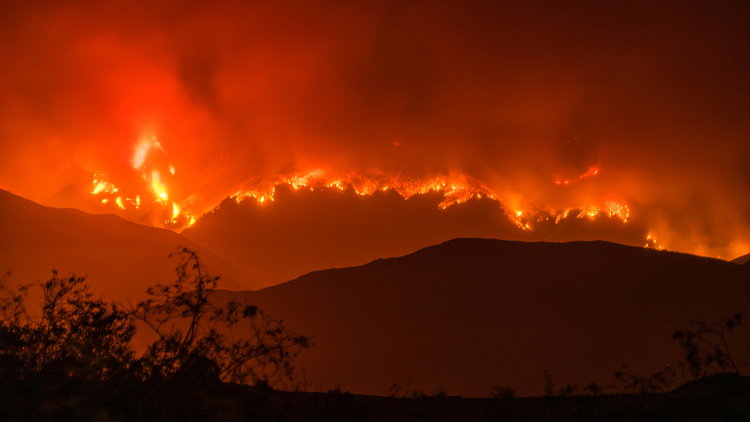 a wildfire in the hills of california