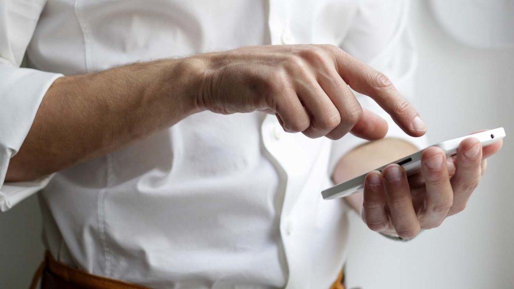 hands holding a smartphone
