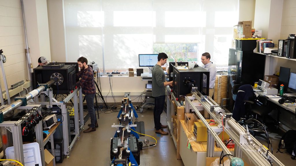 researchers in lab