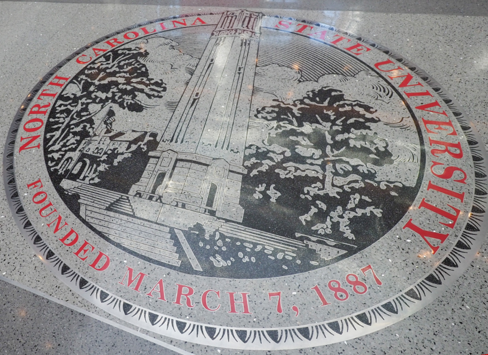 image of seal of NC State on floor