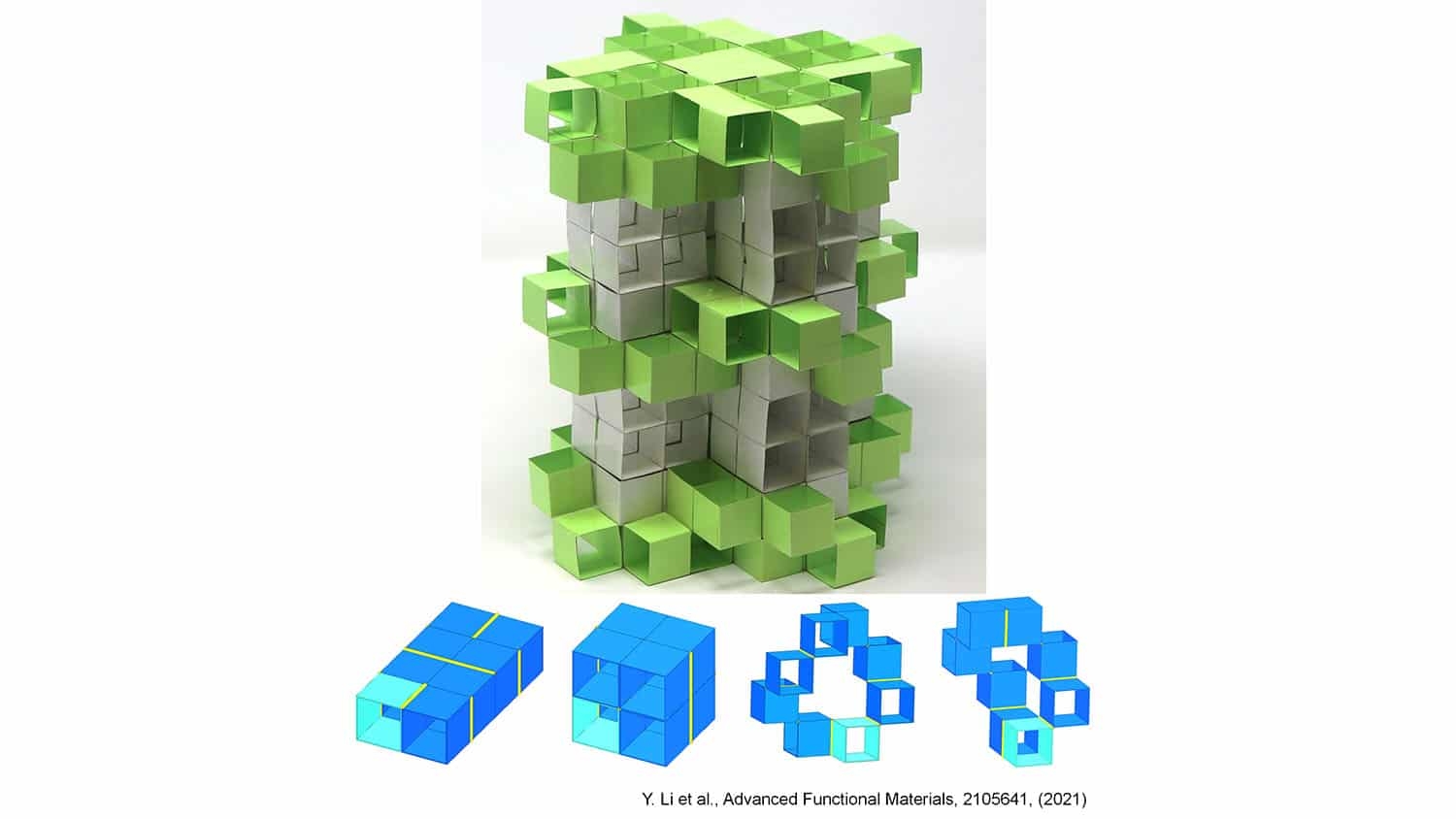 various shapes of metamaterial building blocks lie in front of a much larger structure made from similar blocks
