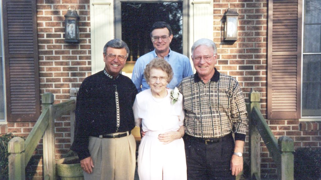 The Ellen brothers, standing from left to right, Ed, Bill and Jim, with their mother, Bessie Morton Ellen.