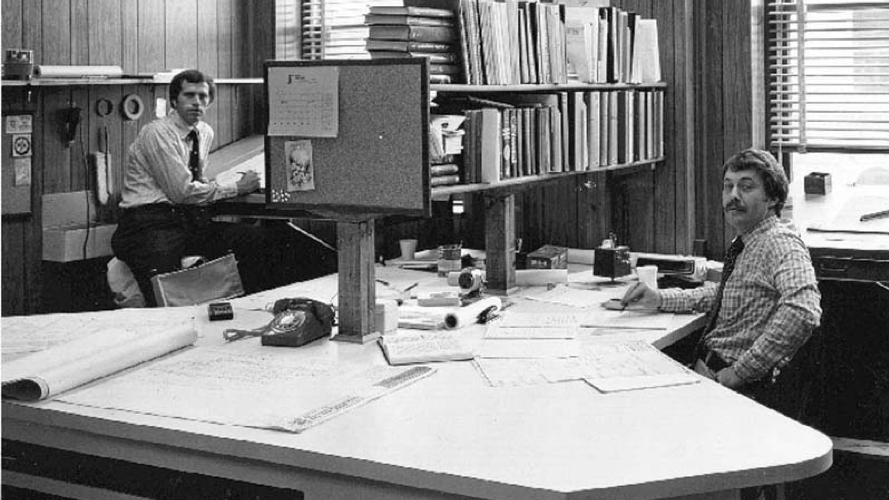 Creed, right, with Herb McKim in their first office in Wilmington in 1978.