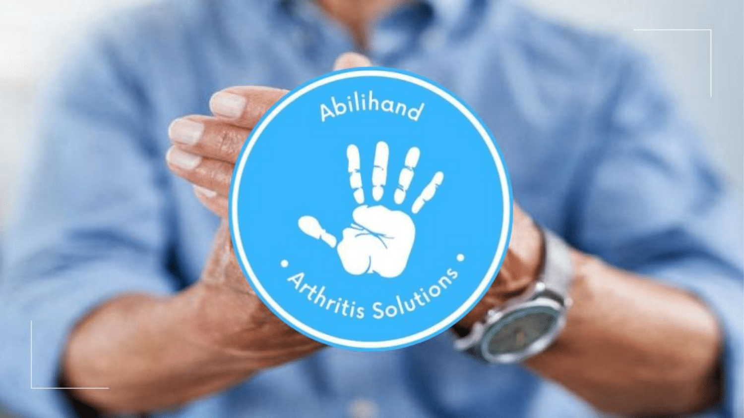 Logo of Abilihand team (a light blue circle with a white handprint in the center; white text above and below hand within the circle).