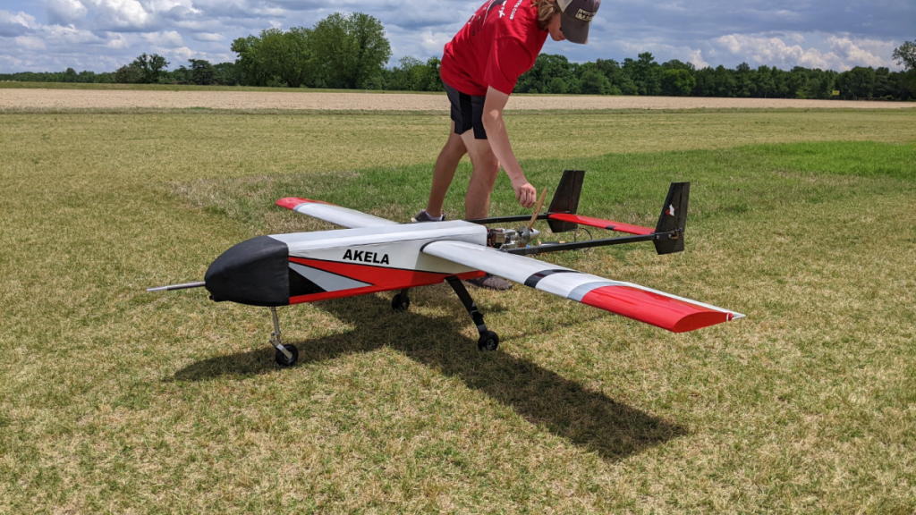 An ARC team member preps their aerial drone for flight.