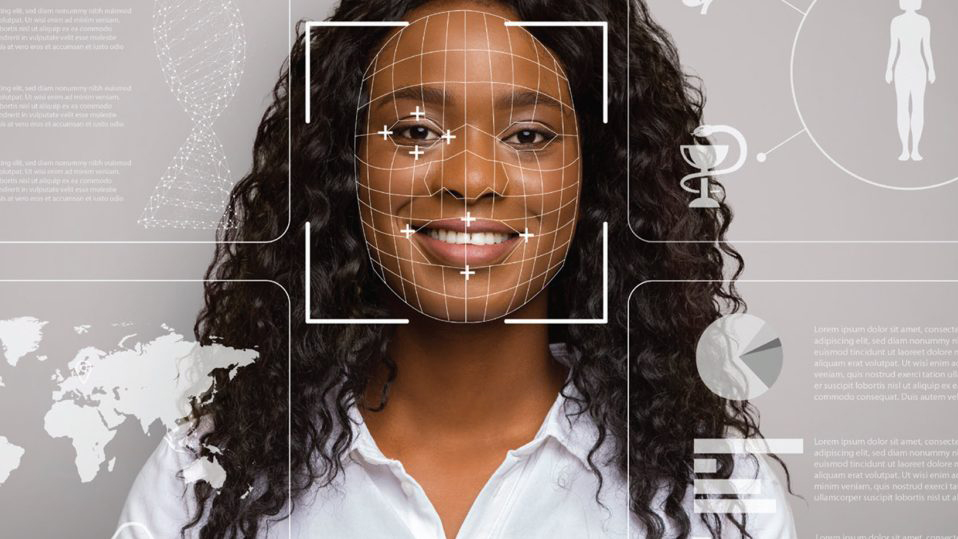 African-American woman in white shirt behind superimposed computer graphics.
