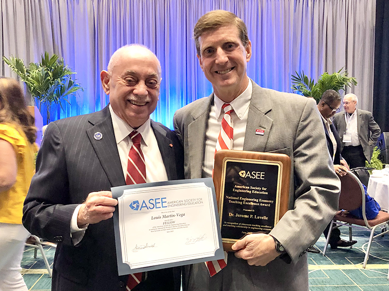 Louis Martin-Vega, left, and Jerome Lavelle are shown with their awards during the American Society for Engineering Education 2022 annual conference.