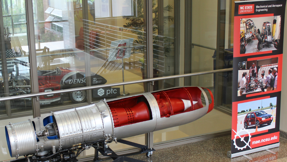 Open cross-section of small rocket on display in the lobby of the Department of Mechanical and Aerospace Engineering.