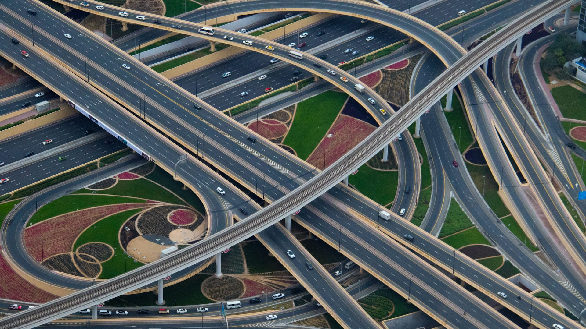 Aerial view of interstate interchange with looping lanes.