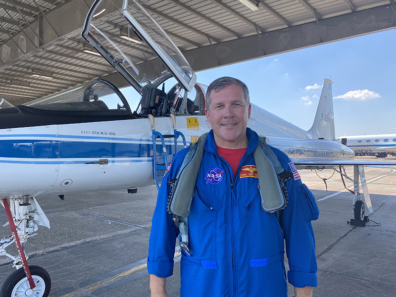 Trent Kingery, shown with a T-38N supersonic jet, which NASA uses to flight-train astronauts.