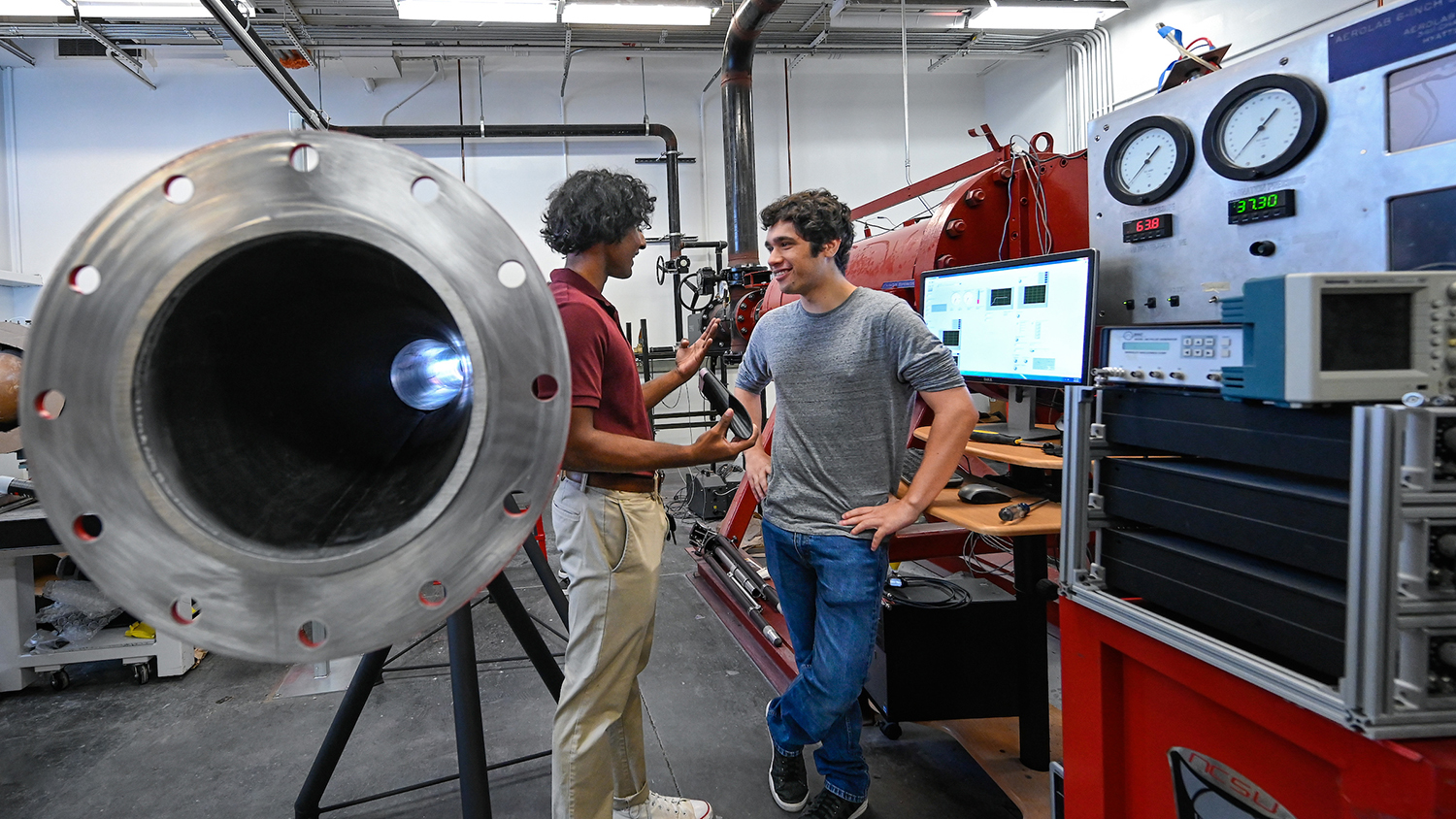 Aerospace engineering students work in the nearly completed hypersonic wind tunned lab. The students are working under Dr. Venkat Narayanaswamy. Photo by Marc Hall