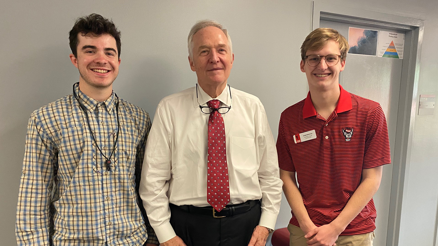 Ken Stevens, center, with Caldwell Fellows Luke Caplice and Adam McIntosh.