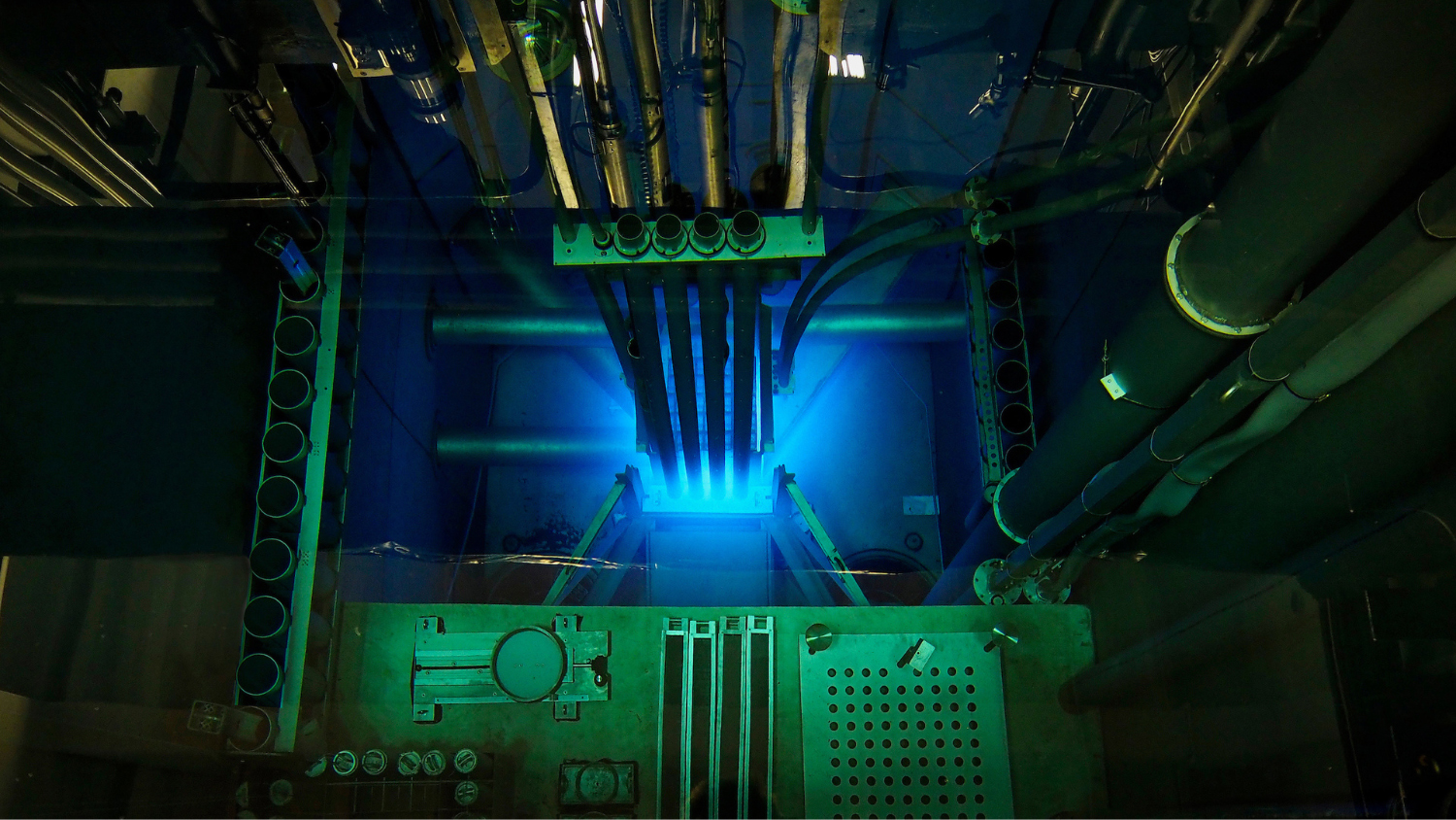 A view inside of the NC State PULSTAR nuclear reactor. Rods are in blue with the surrounding parts in green.