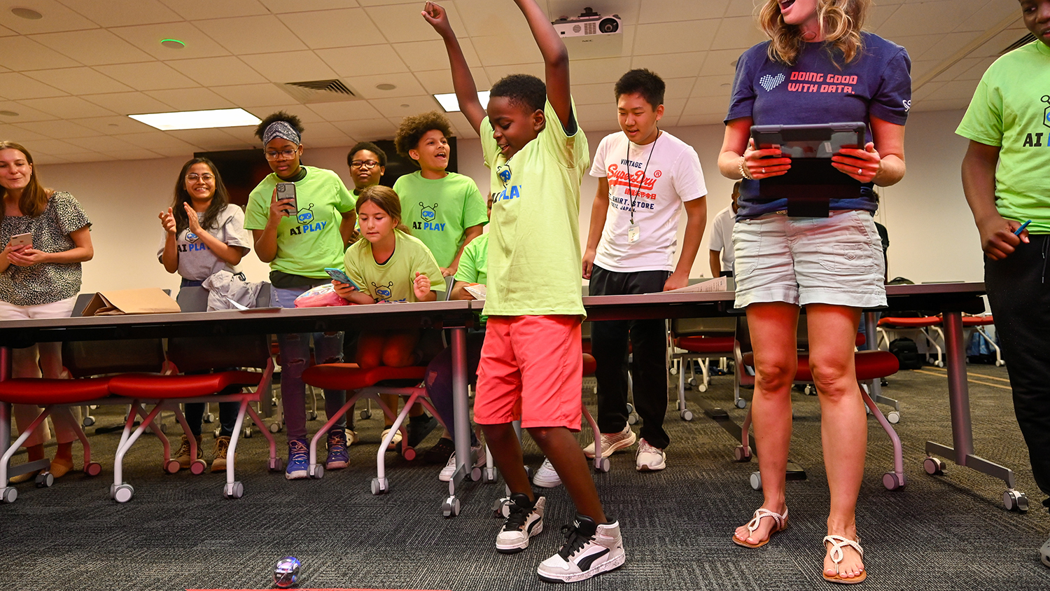 Students from PItt county visited Centennial Campus for an engineering computer science camp that dealt with AI and robotics. Students coded movement of a small, spherical robot around an obstical course.
