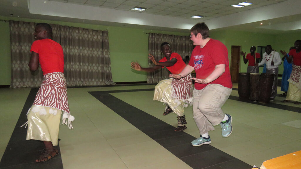 Amy Isvik dances during a previous trip to Rwanda. 
