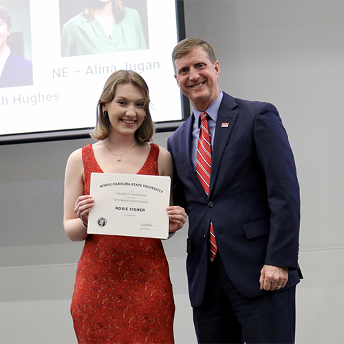 Rosie Fisher, left, receives Outstanding Senior Award from Dr. Jerome Lavelle.