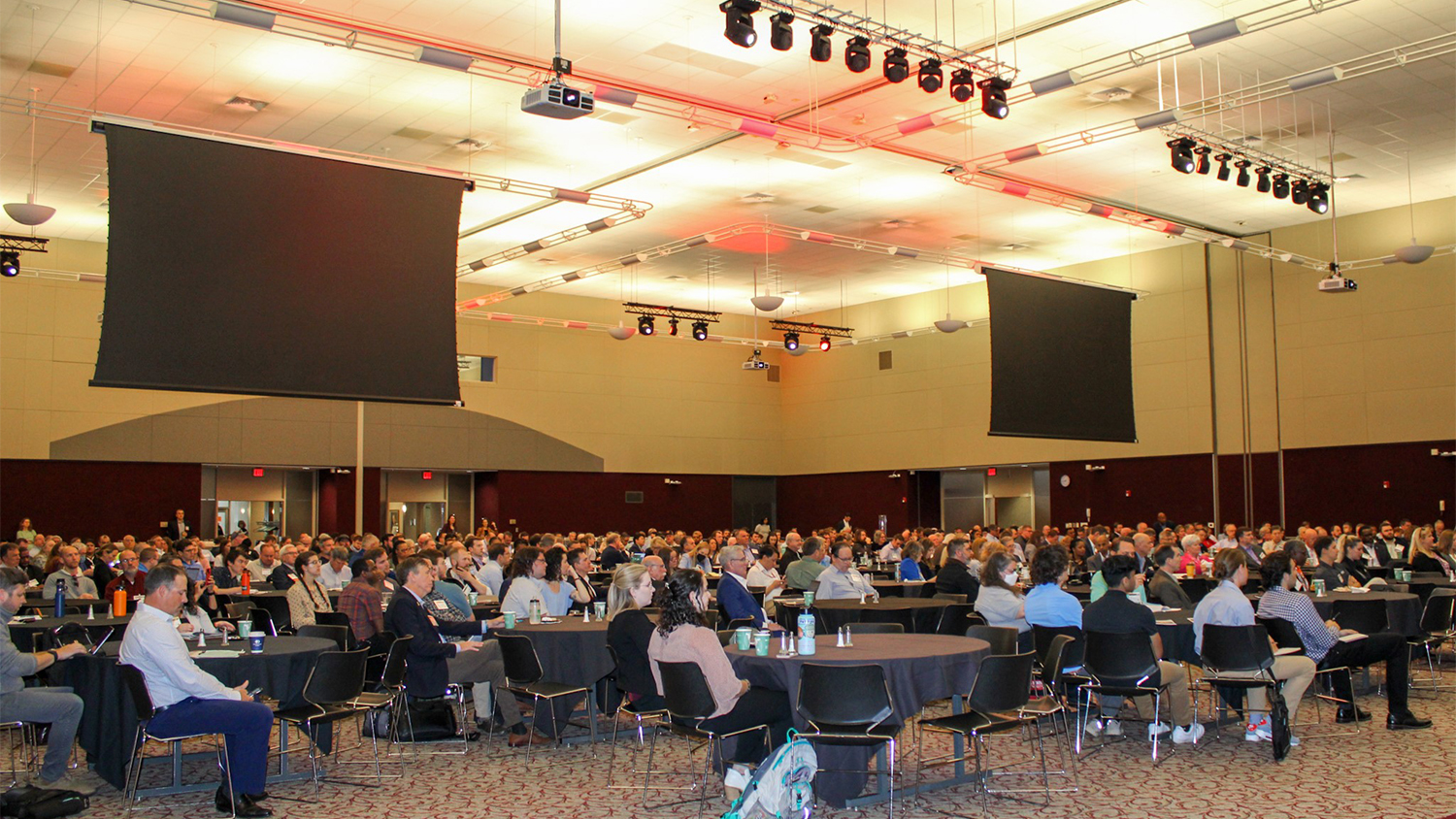 Wide angle photo of ballroom full of seated attendees at the 2023 Southern Energy Conference.