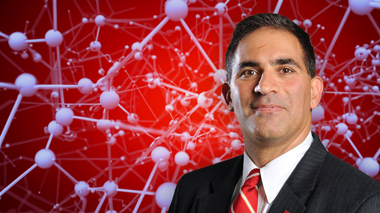 Image of Justin Schwartz on a red background and connected molecules in greyish-white.