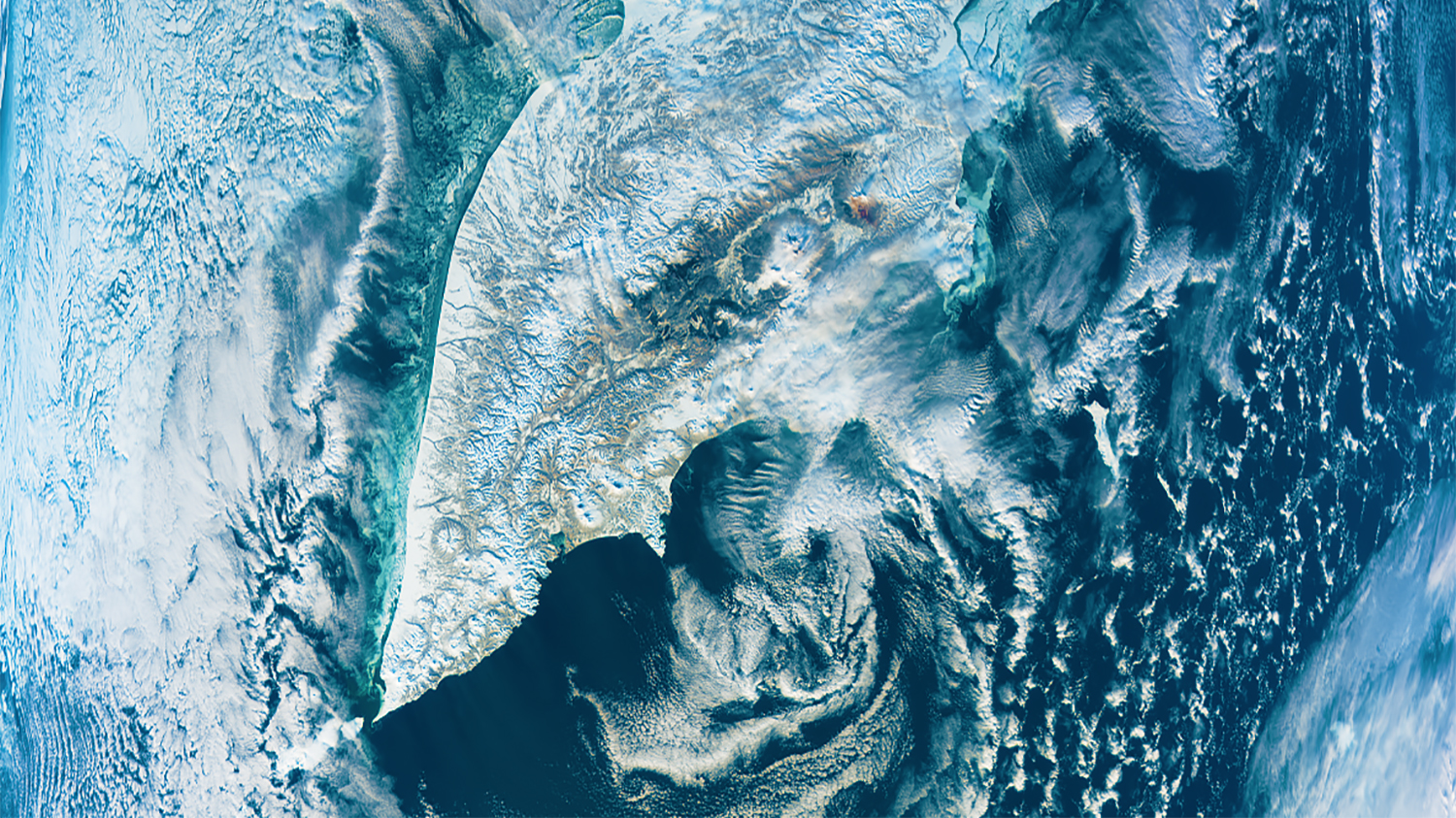 This image depicts the Kamchatka peninsula in Russia, one of the first images from the NASA Plankton, Aerosol, Cloud, and ocean Ecosystem (PACE) mission. Credit: NASA/PACE