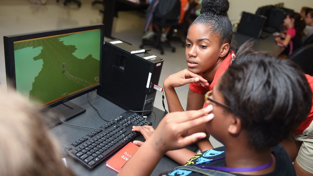 Middle school students participate in Girls Game Design camp.