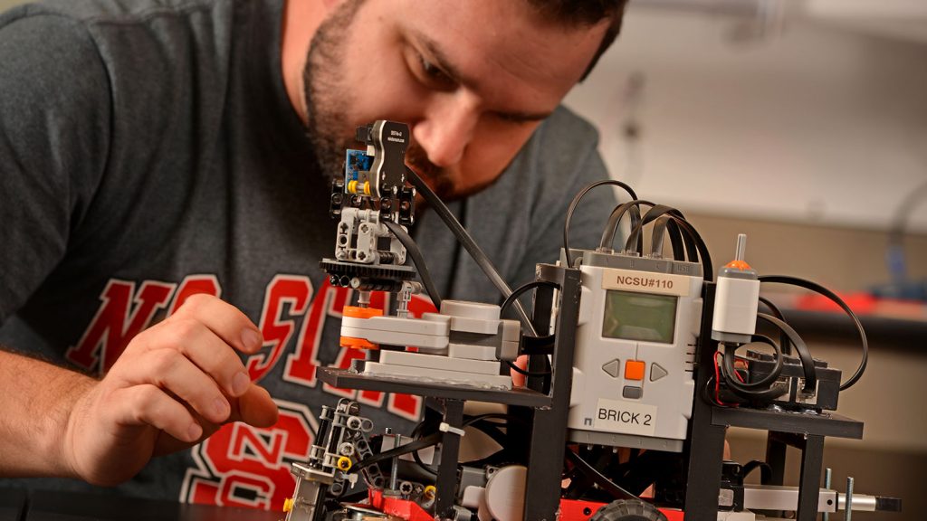 Engineering student at CCC works on project.